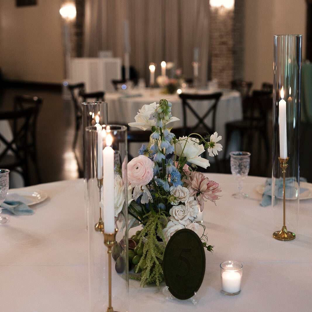 Pastel reception centerpiece at The Springs Waxahachie with white roses and pink florals by B.blumen